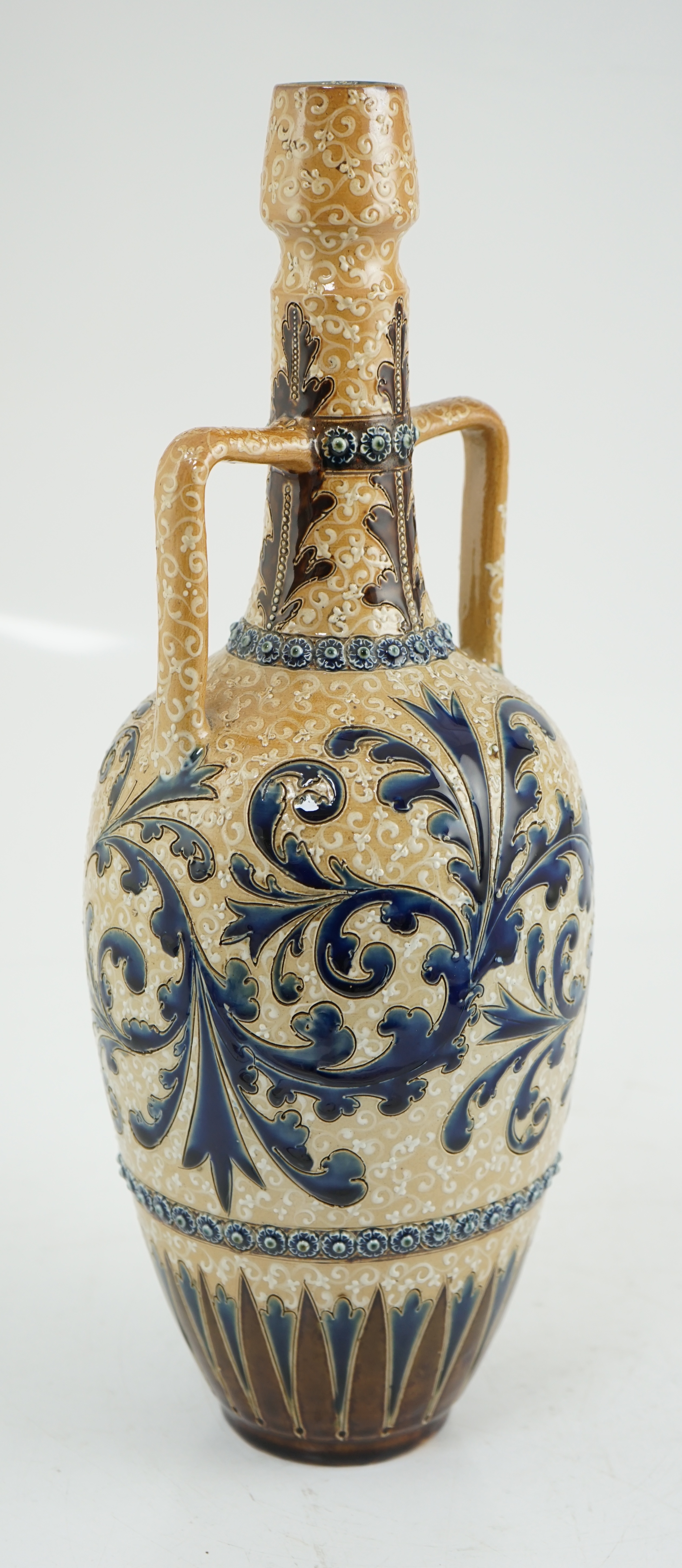 George Tinworth for Doulton Lambeth, a large stoneware vase, with scrolling blue foliate decoration, monogrammed and dated 1884, 40cm high. Condition - good